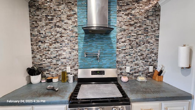 24501 S County Rd 1210, Midland, TX 79706 - kitchen with electric stove, wall chimney range hood, tasteful backsplash, and dark countertops