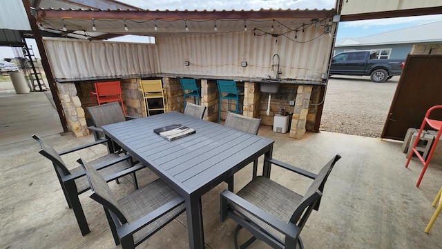 24501 S County Rd 1210, Midland, TX 79706 - view of patio / terrace featuring outdoor dining area and a sink