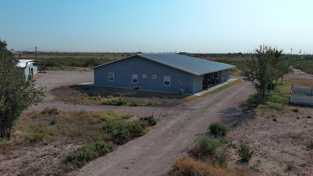 24501 S County Rd 1210, Midland, TX 79706 - view of home's exterior featuring a view of rural / pastoral area and driveway