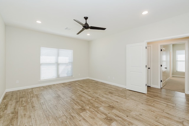 unfurnished room featuring recessed lighting and light wood finished floors