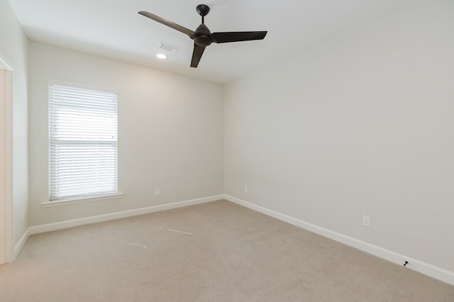 unfurnished room featuring recessed lighting, baseboards, light colored carpet, and a ceiling fan