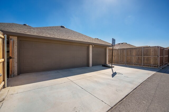 detached garage with fence