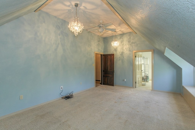 bonus room featuring carpet, ceiling fan, a textured ceiling, and vaulted ceiling