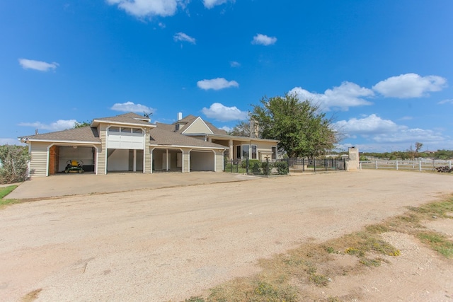 view of front of property featuring a garage