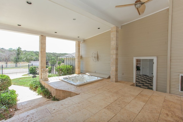 view of patio / terrace featuring ceiling fan