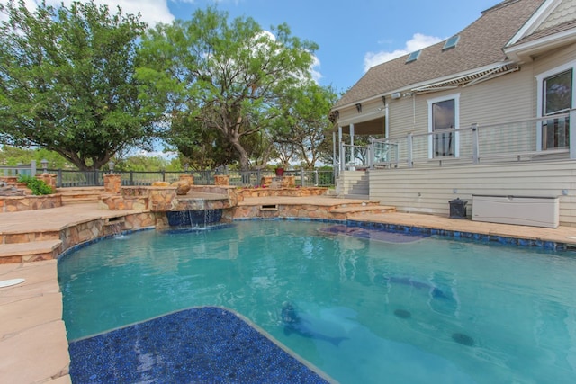 view of pool featuring pool water feature