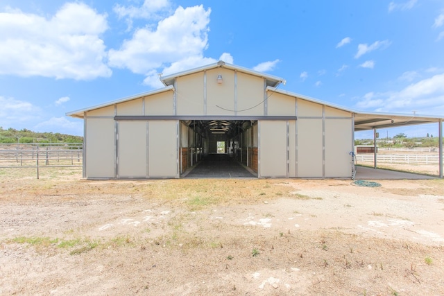 view of outbuilding with a rural view