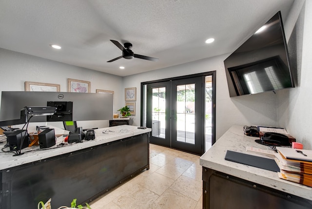 office with french doors, ceiling fan, and a textured ceiling