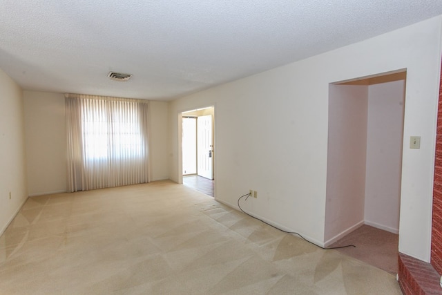 1900 Goliad St, Big Spring, TX 79720 - carpeted spare room with baseboards