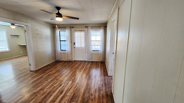 entryway with ceiling fan and wood finished floors