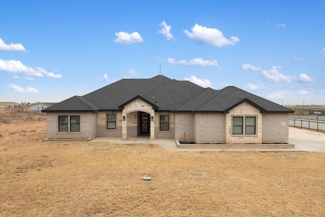 view of front of house with a patio