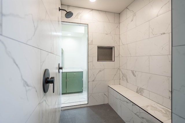 full bathroom with tiled shower