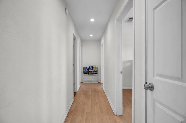 2401 Morrison Dr, Big Spring, TX 79720 - corridor with recessed lighting, baseboards, light wood finished floors, and visible vents