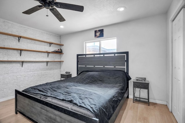 2401 Morrison Dr, Big Spring, TX 79720 - bedroom with baseboards, wood finished floors, and recessed lighting