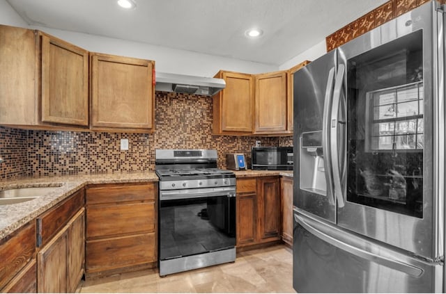 2401 Morrison Dr, Big Spring, TX 79720 - kitchen featuring a sink, tasteful backsplash, ventilation hood, and appliances with stainless steel finishes