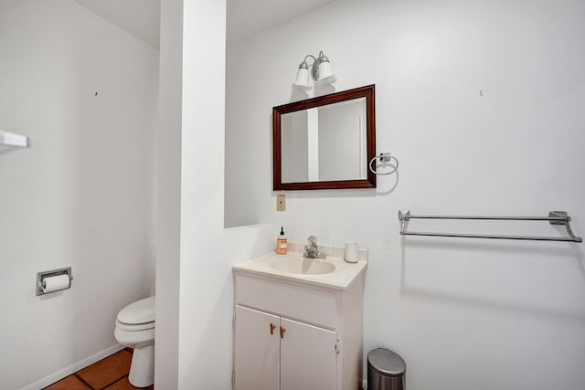 907 Harvard Ave, Midland, TX 79701 - half bath featuring toilet, vanity, and tile patterned flooring