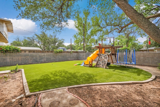907 Harvard Ave, Midland, TX 79701 - view of playground with a trampoline