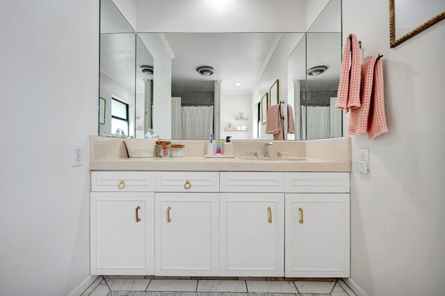 907 Harvard Ave, Midland, TX 79701 - full bathroom with baseboards, a shower with curtain, double vanity, and ornamental molding