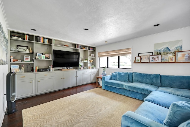 907 Harvard Ave, Midland, TX 79701 - living room with dark wood finished floors, recessed lighting, and a textured ceiling
