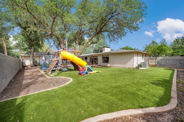 907 Harvard Ave, Midland, TX 79701 - view of yard featuring a playground and cooling unit