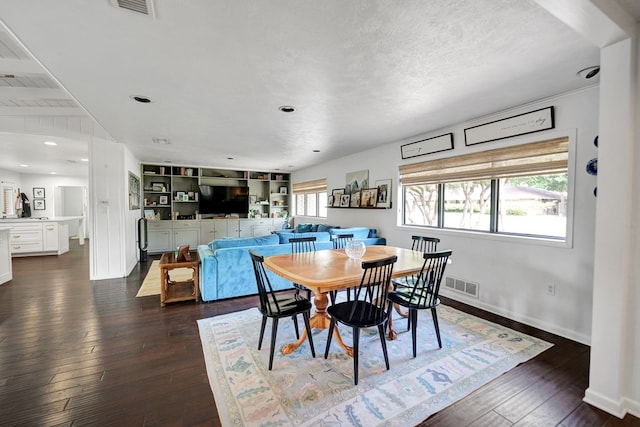 907 Harvard Ave, Midland, TX 79701 - dining space featuring dark wood-style floors, baseboards, and recessed lighting