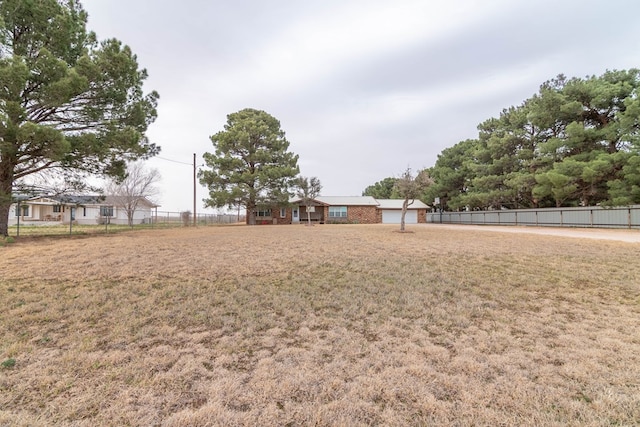 view of yard featuring fence