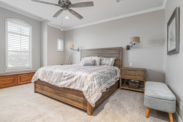 bedroom featuring ceiling fan, ornamental molding, recessed lighting, and light colored carpet