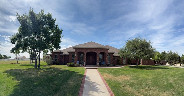 view of front of house with brick siding