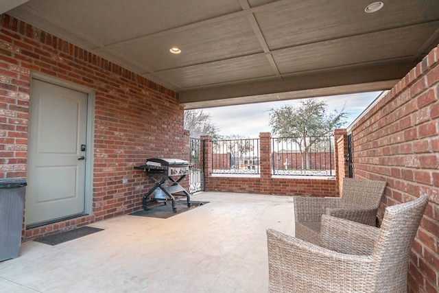 view of patio / terrace with fence