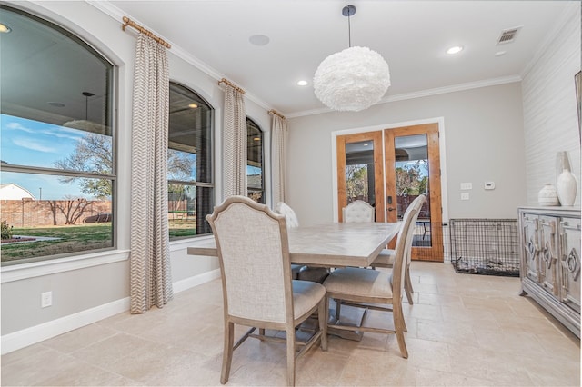 dining space with baseboards, visible vents, crown molding, french doors, and recessed lighting