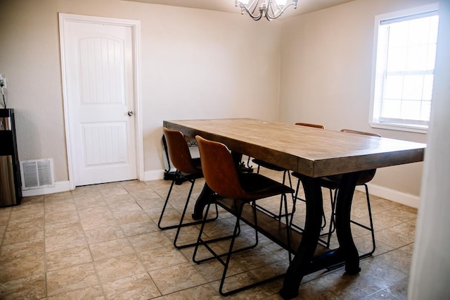 dining room with an inviting chandelier