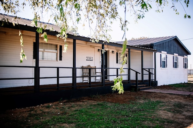 exterior space with a porch