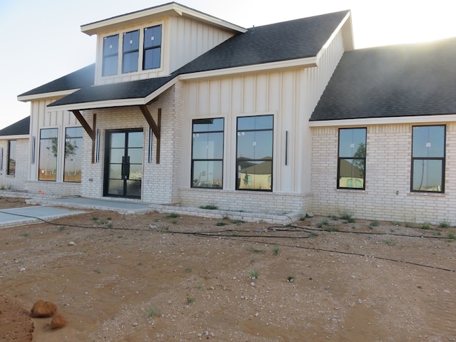9811 E County Rd 108, Midland, TX 79706 - modern farmhouse featuring board and batten siding and brick siding