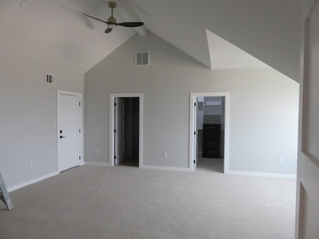 9811 E County Rd 108, Midland, TX 79706 - unfurnished bedroom with beam ceiling, carpet floors, high vaulted ceiling, connected bathroom, and ceiling fan