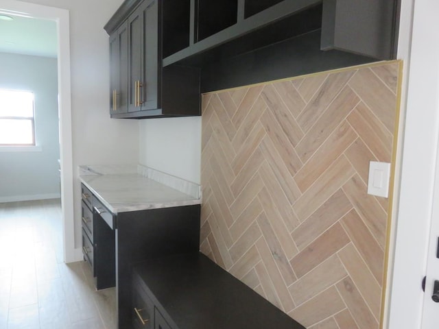 9811 E County Rd 108, Midland, TX 79706 - kitchen with light countertops and baseboards
