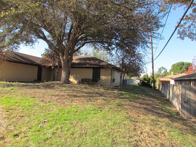 view of yard with fence