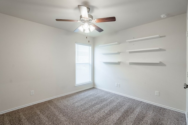 unfurnished room featuring ceiling fan and carpet flooring