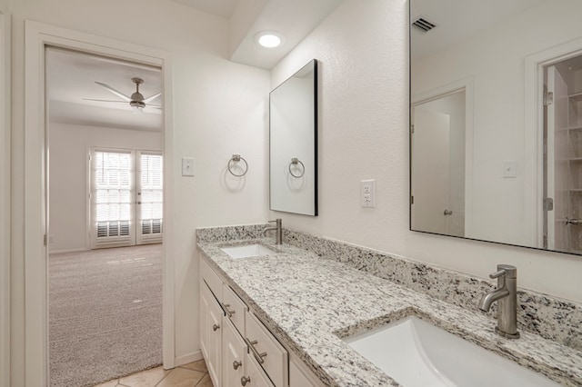 bathroom with vanity, tile patterned floors, and ceiling fan