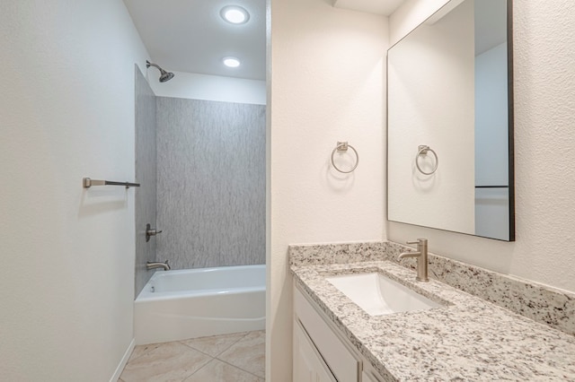 bathroom with tile patterned floors, shower / washtub combination, and vanity