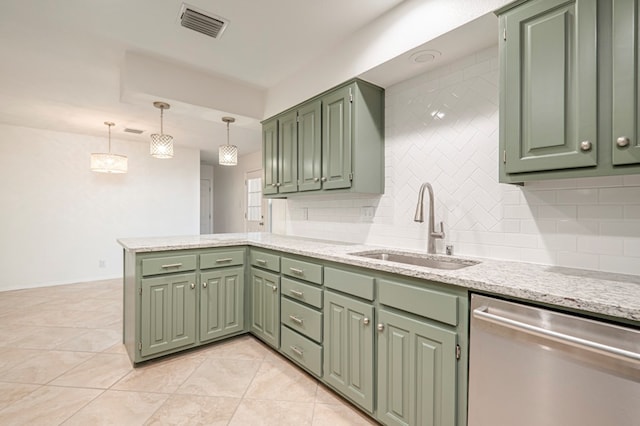 kitchen featuring sink, green cabinets, stainless steel dishwasher, kitchen peninsula, and decorative light fixtures