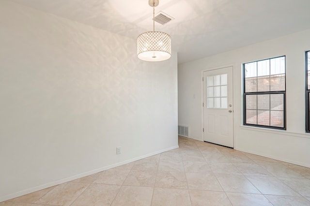 empty room featuring light tile patterned flooring