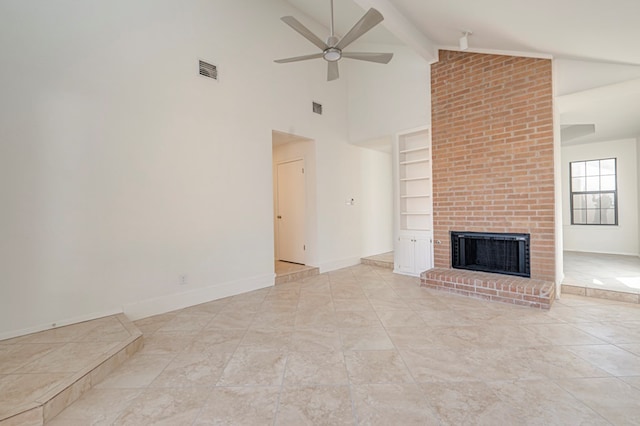 unfurnished living room featuring high vaulted ceiling, ceiling fan, built in features, a fireplace, and beamed ceiling