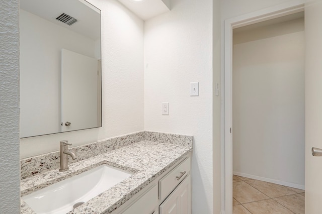 bathroom featuring vanity and tile patterned floors