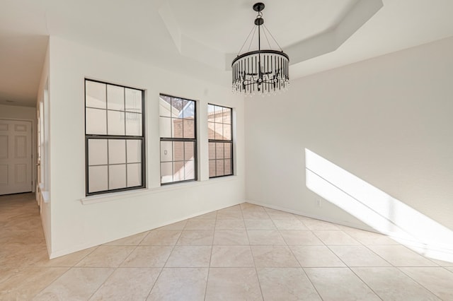 unfurnished dining area featuring a tray ceiling, light tile patterned flooring, and a notable chandelier