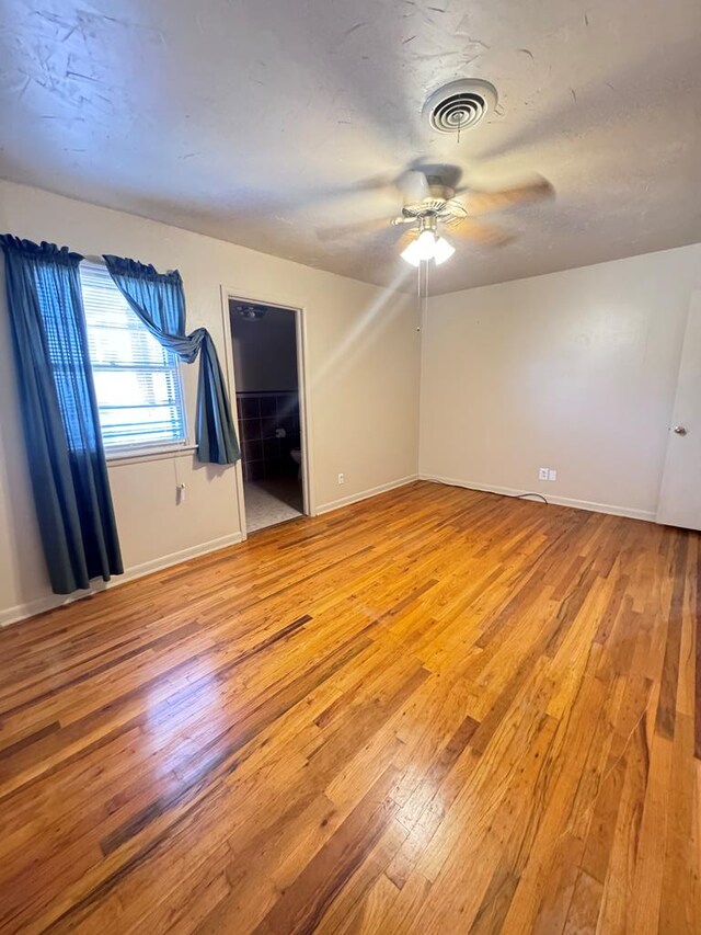 2100 42nd St, Snyder, TX 79549 - spare room with ceiling fan and light hardwood / wood-style floors