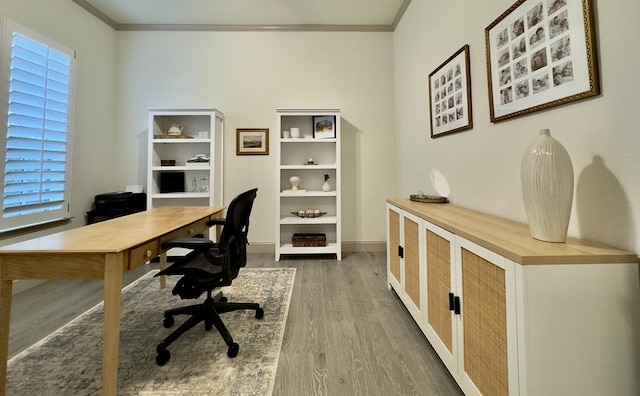 office featuring dark hardwood / wood-style flooring and ornamental molding