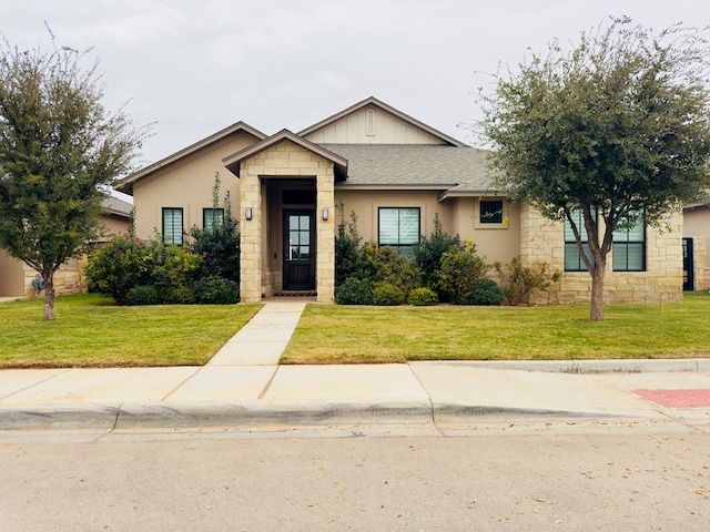 view of front facade with a front yard