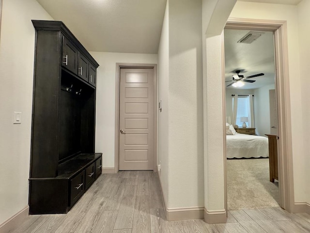 hall featuring light wood-type flooring