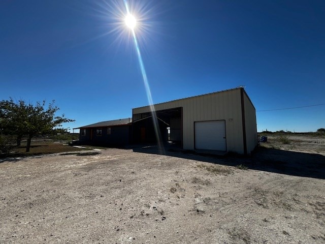 view of outdoor structure featuring a garage