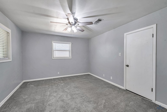 3404 W Michigan Ave, Midland, TX 79703 - spare room featuring ceiling fan, carpet, and baseboards
